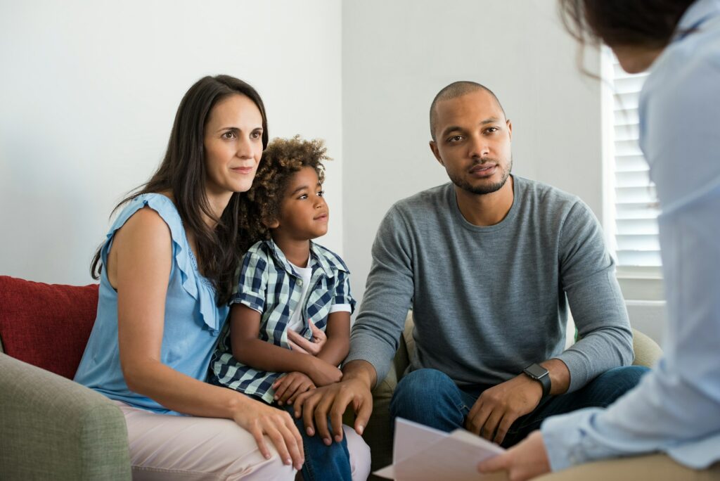 Couple talking to family counselor